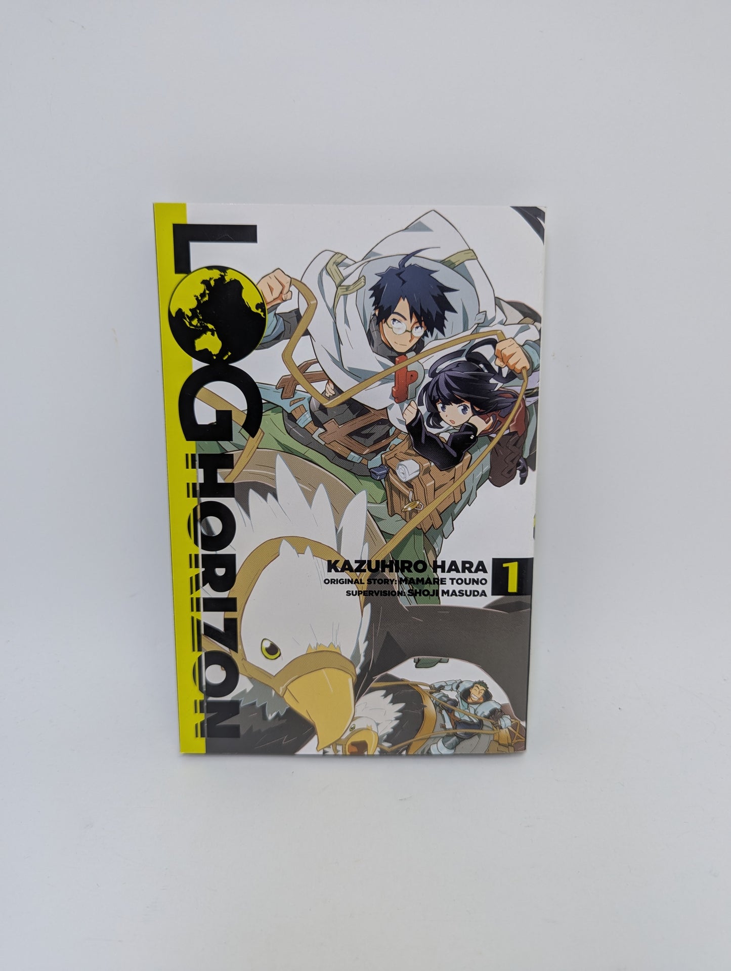 „Log Horizon, Vol. 1“ – įtraukiančia fantasy manga apie virtualų pasaulį, anglų kalba
