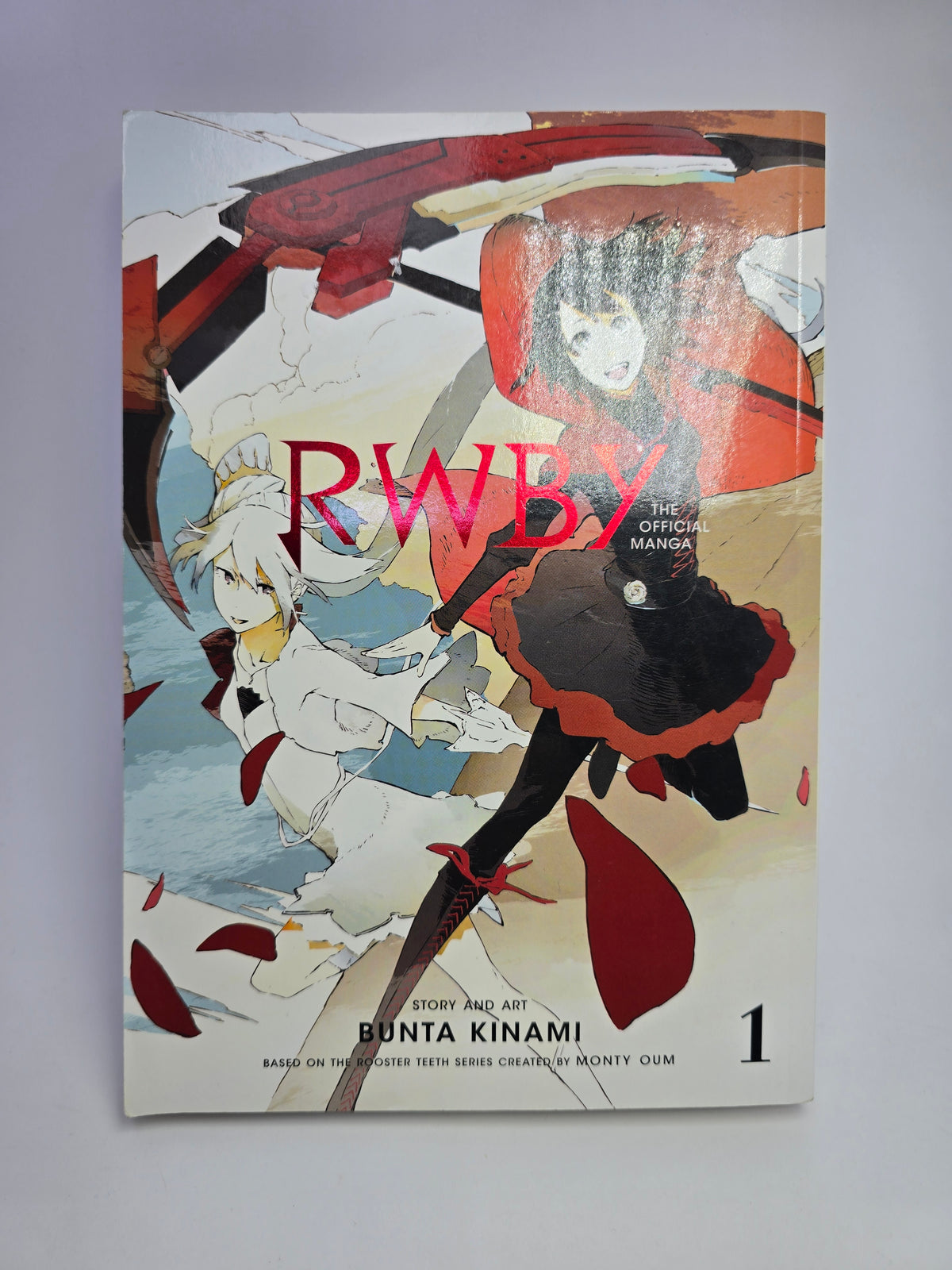 RWBY The Official Manga Vol 1 manga viršelis su Bunta Kinami iliustracija   