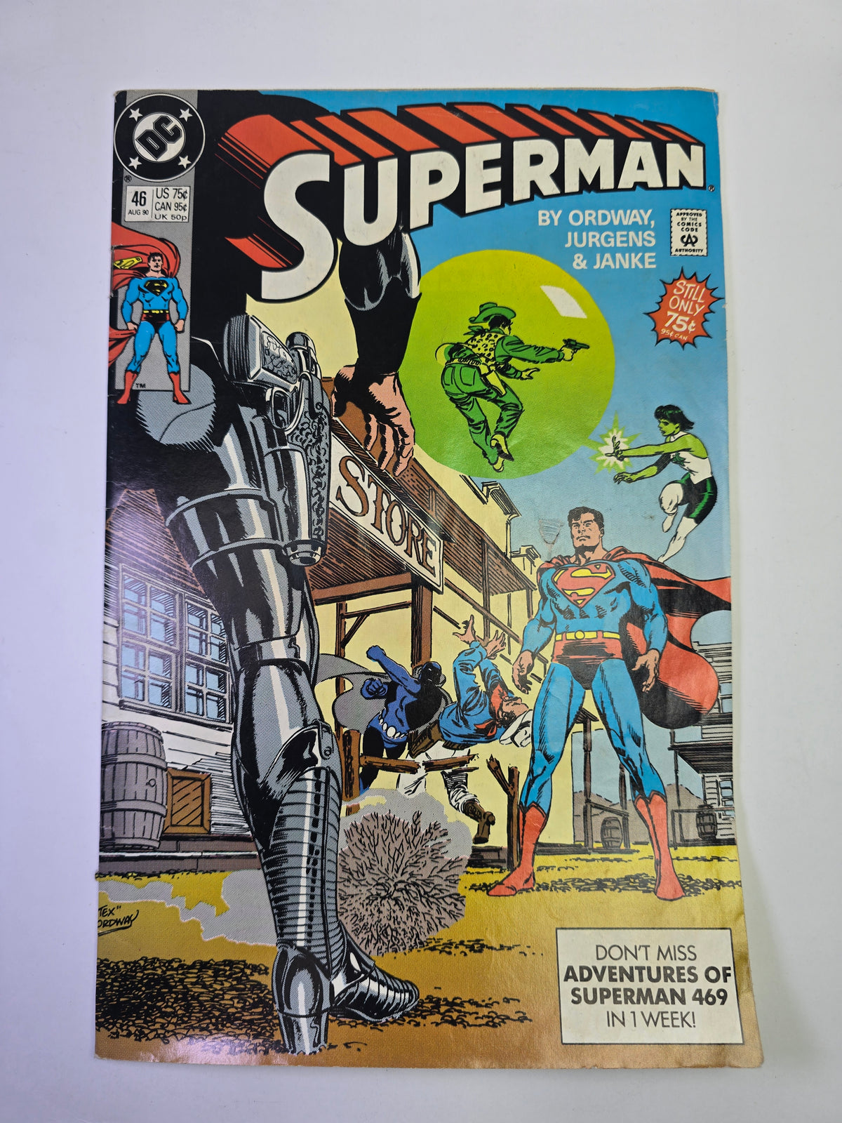 Superman #46 DC Comics komikso viršelis su Supermenu ir kaubojų elementais