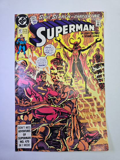 Superman #47 DC Comics komikso viršelis su Supermeno ir demonų kova ugnies fone