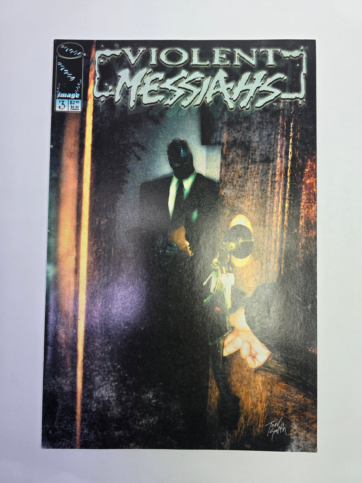 Violent Messiahs #3 Image Comics komikso viršelis su paslaptingo personažo iliustracija   