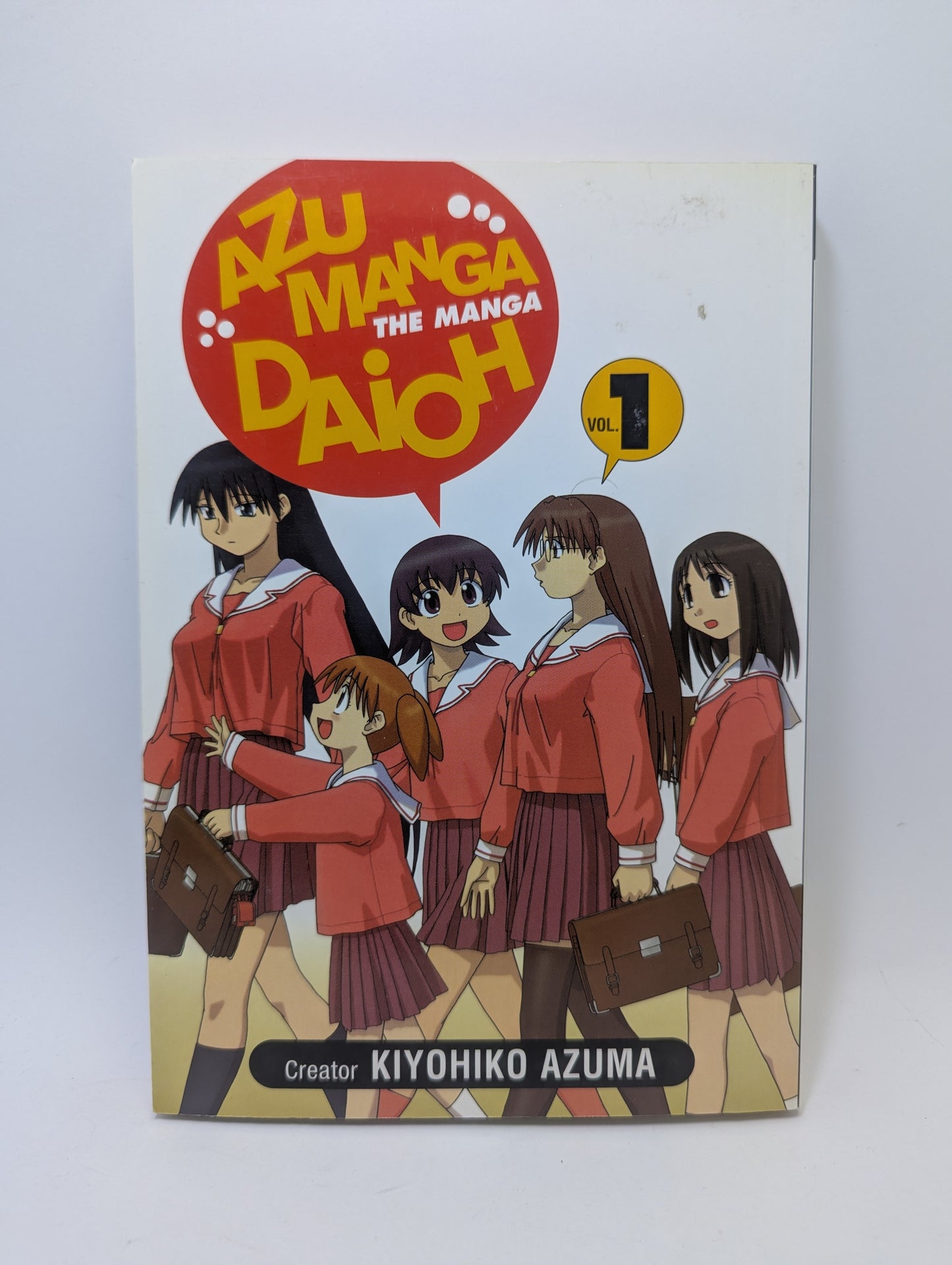 „Azumanga Daioh, Vol. 1“ mangos leidimas anglų kalba apie linksmą mokyklos kasdienybę.