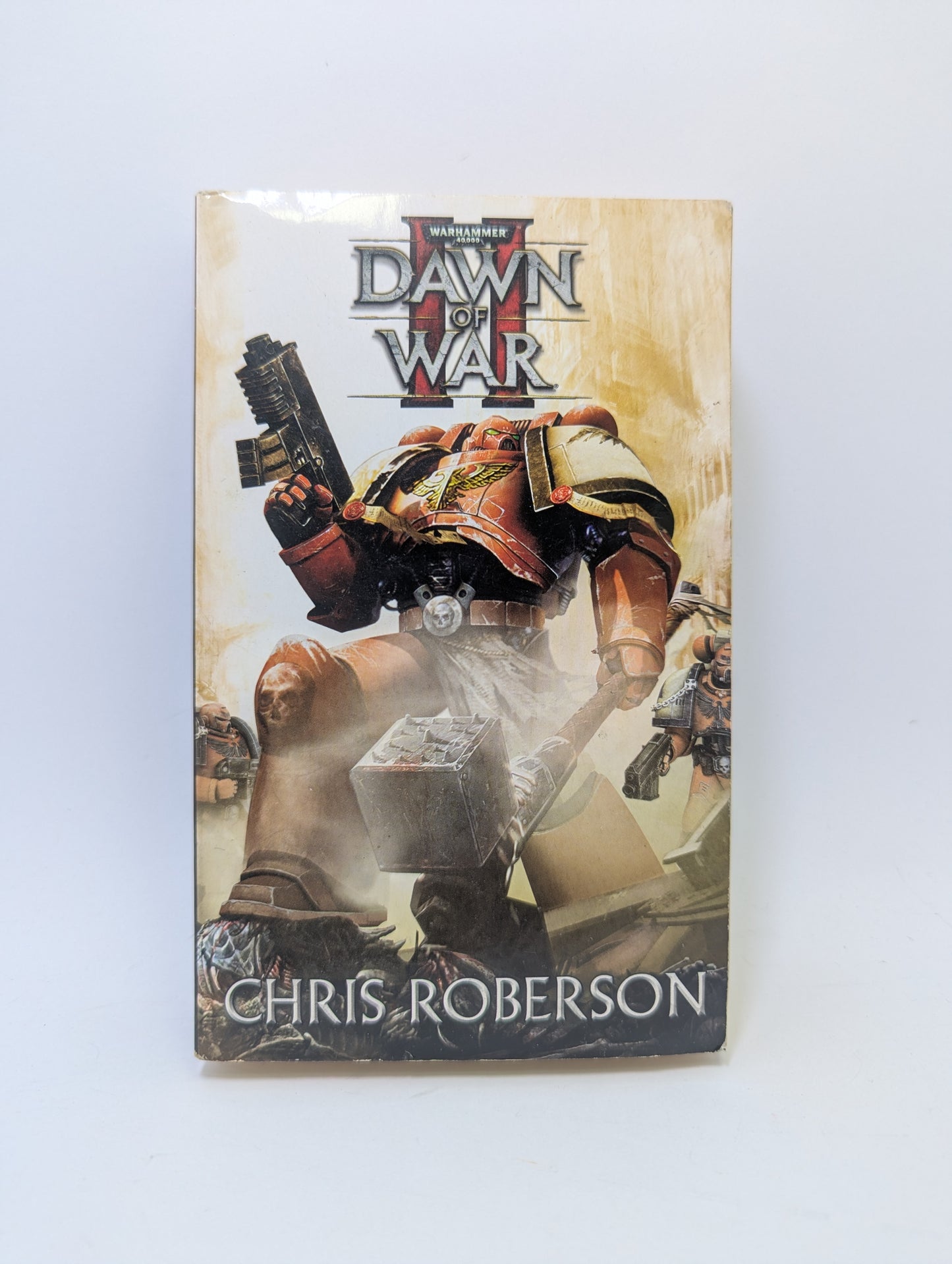 Warhammer 40K knyga „Dawn of War II“ su Space Marines ir grimdark mokslinės fantastikos viršelio dizainu.