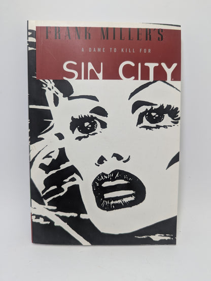 Grafinės novelės Sin City Vol. 2: A Dame to Kill viršelis su noir stiliaus juodai balta iliustracija.