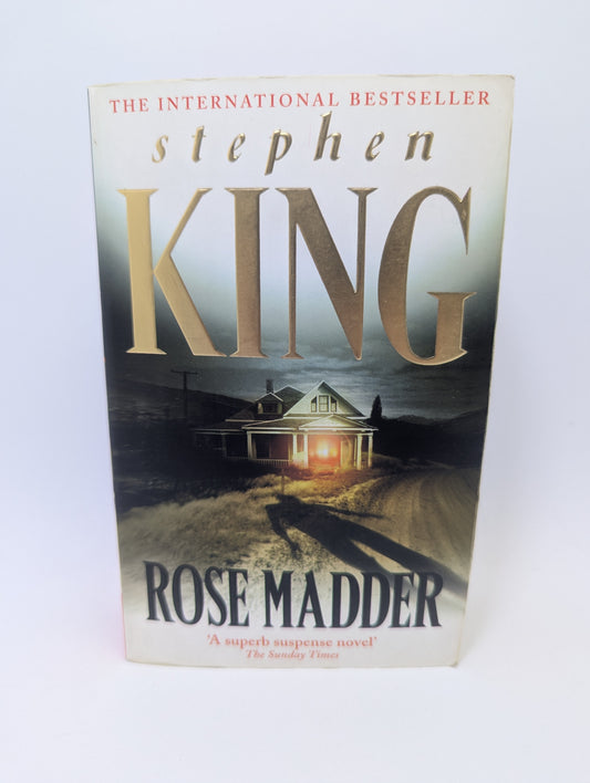 Stephen King knyga Rose Madder apie moters pabėgimą ir mistinį paveikslą.