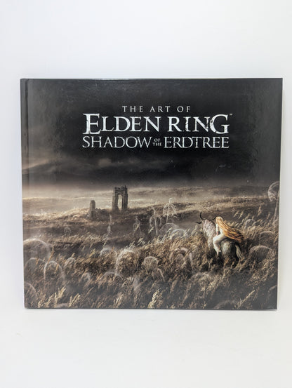 Meno knygos The Art of Elden Ring: Shadow of the Erdtree viršelis su žaidimo koncepciniais piešiniais.