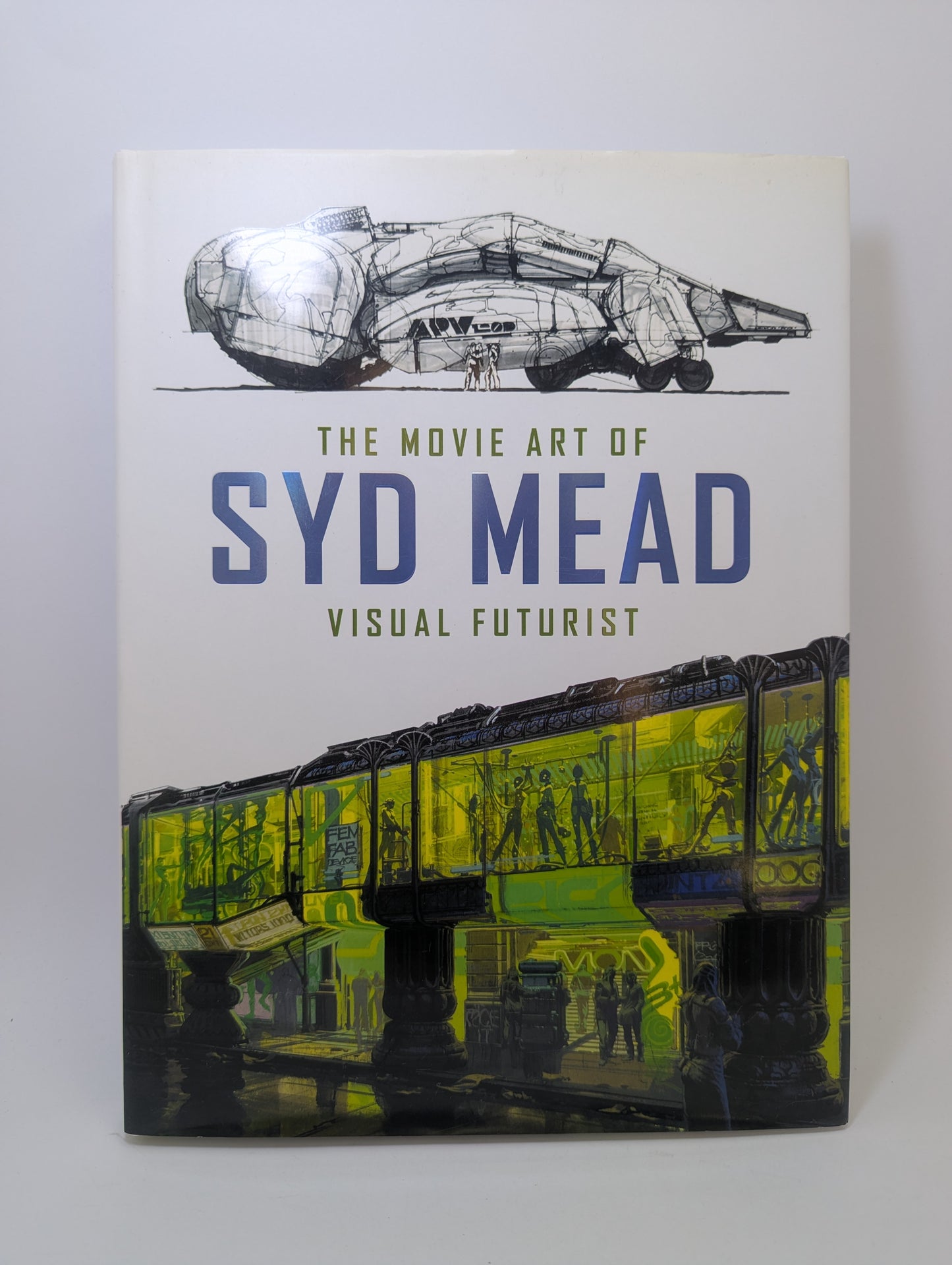 Meno knygos The Movie Art of Syd Mead: Visual Futurist viršelis su futuristinio kino konceptinio meno iliustracijomis.