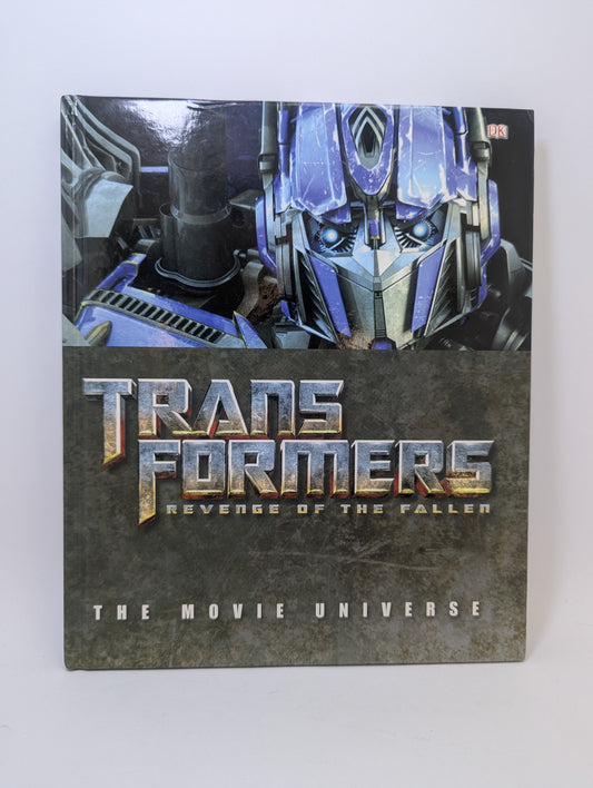 Meno knygos Transformers: The Movie – Universe viršelis su Autobotų ir Deceptikonų dizaino iliustracijomis.