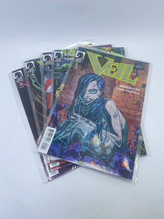  Veil #1–9 – tamsi ir paslaptinga Dark Horse komiksų serija apie moterį su antgamtinėmis galiomis, anglų kalba