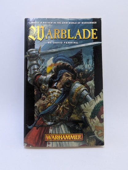 Warhammer Fantasy knyga „Warblade: Vol. 3 (Konrad Trilogy)“ su tamsiu grimdark stiliaus viršelio dizainu ir karo motyvais.
